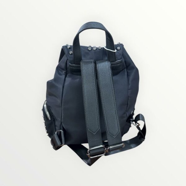 Imagen de WhatsApp 2025-09-29 a las 18.20.56_4084f93c MOCHILA TACHAS